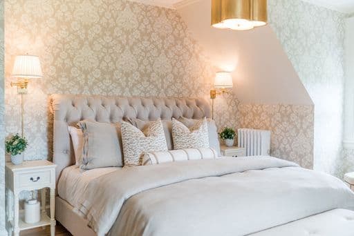 A corner view room on the 3rd floor with a king-sized bed, writing desk, marble tiled bathroom with a walk-in shower. 300 sq. ft.